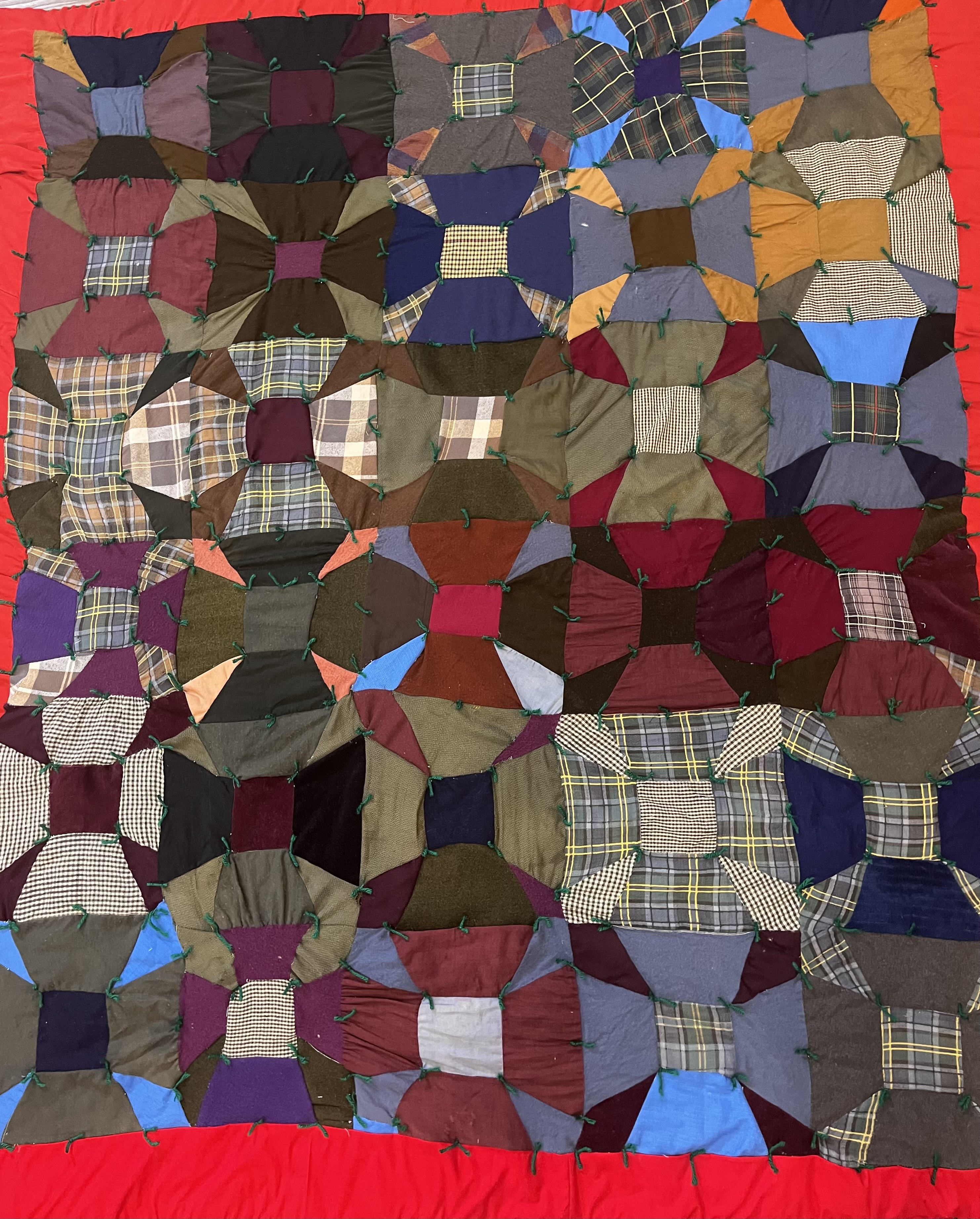 Restoration work — wool and plaid quilt after restoration
