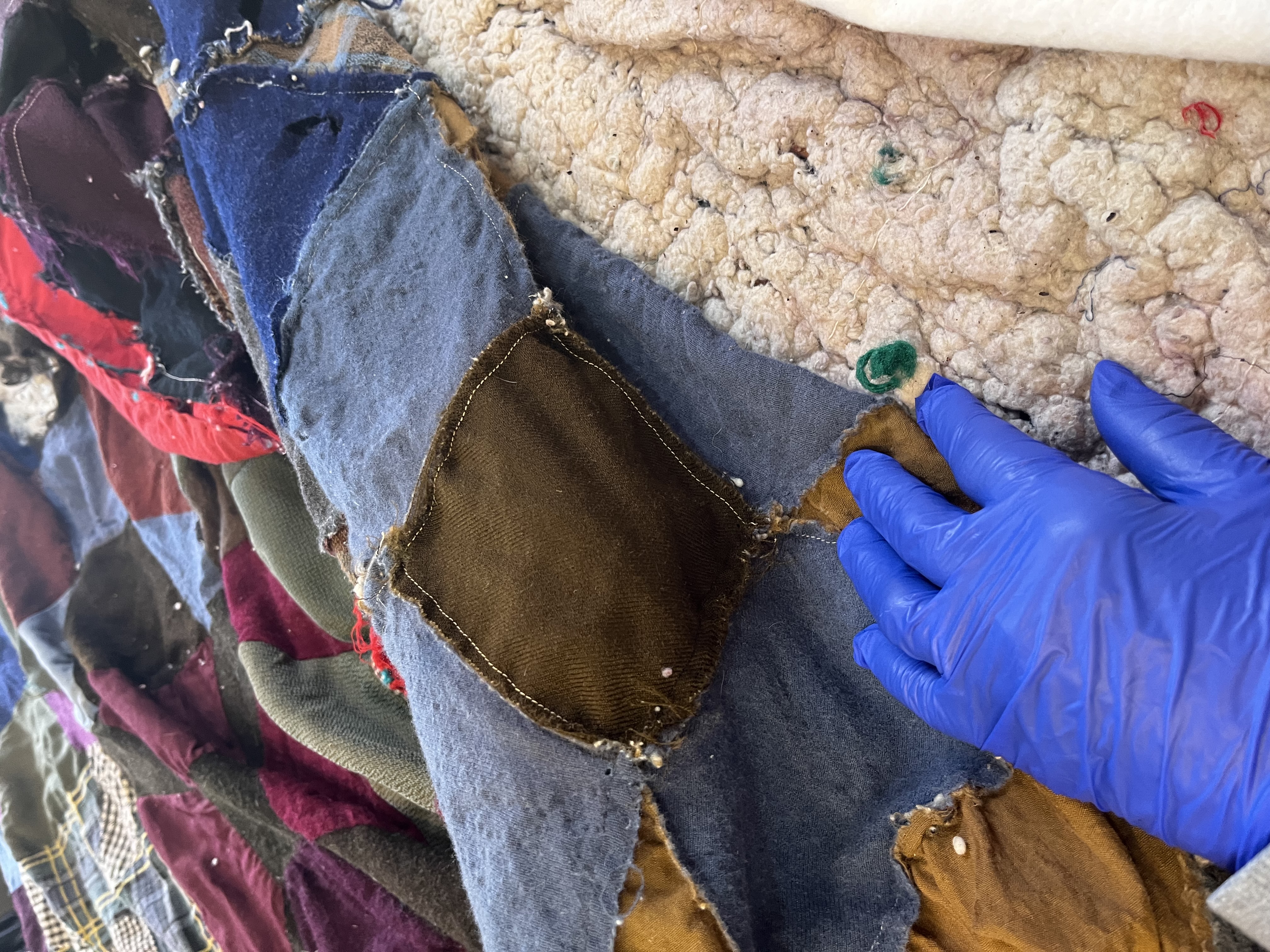 Restoration work — quilt deconstruction step