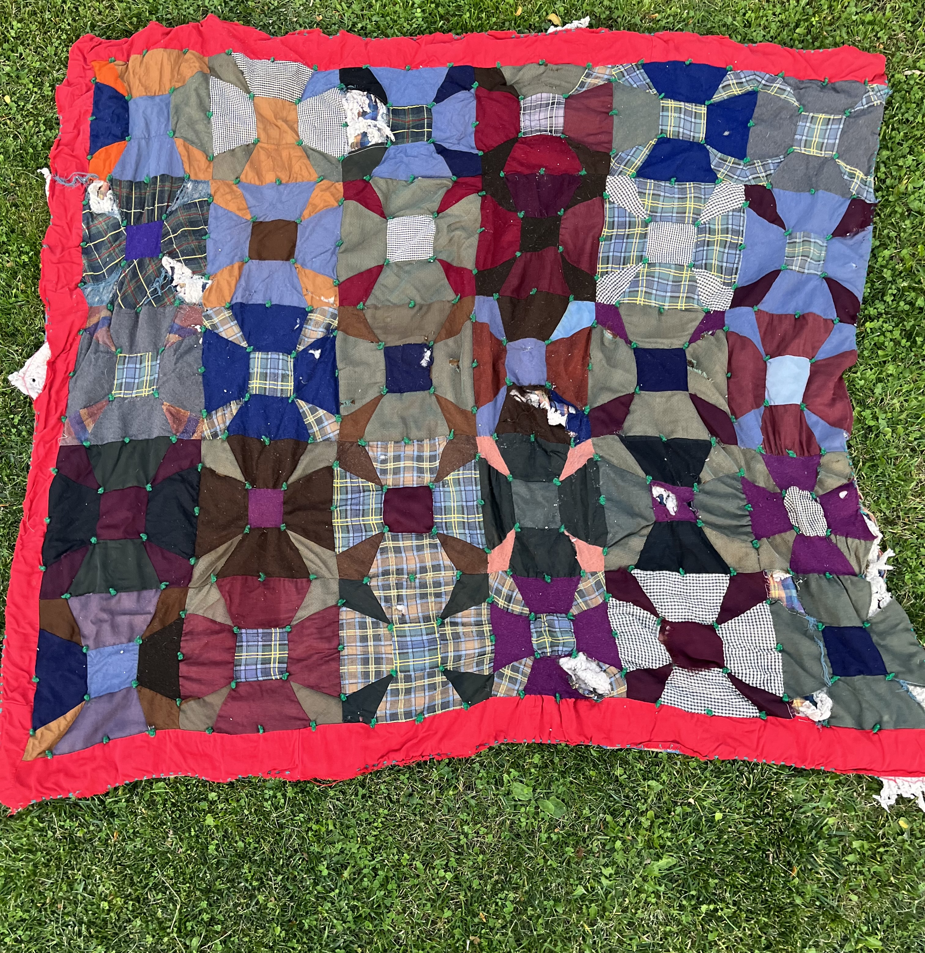 Restoration work — wool and plaid quilt before restoration